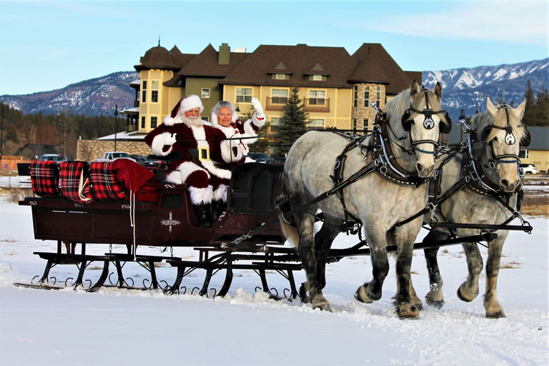 Santa Claus and Mrs. Claus on a sleigh in Pagosa Springs Colorado